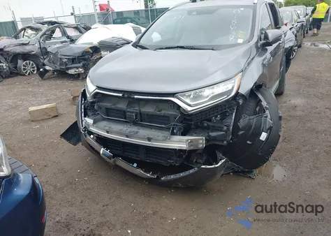 2018 Honda Cr-V Touring z USA, uszkodzony, nr VIN 7FARW2H90JE018638